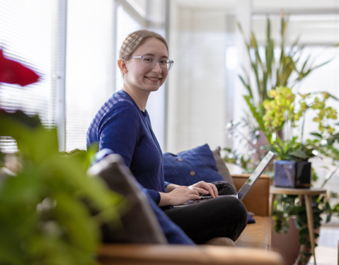 woman sitting with laptop